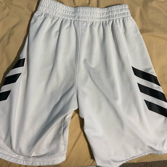 White Adidas Shorts with Three Black Stripes on Legs - Picture 2 of 3
